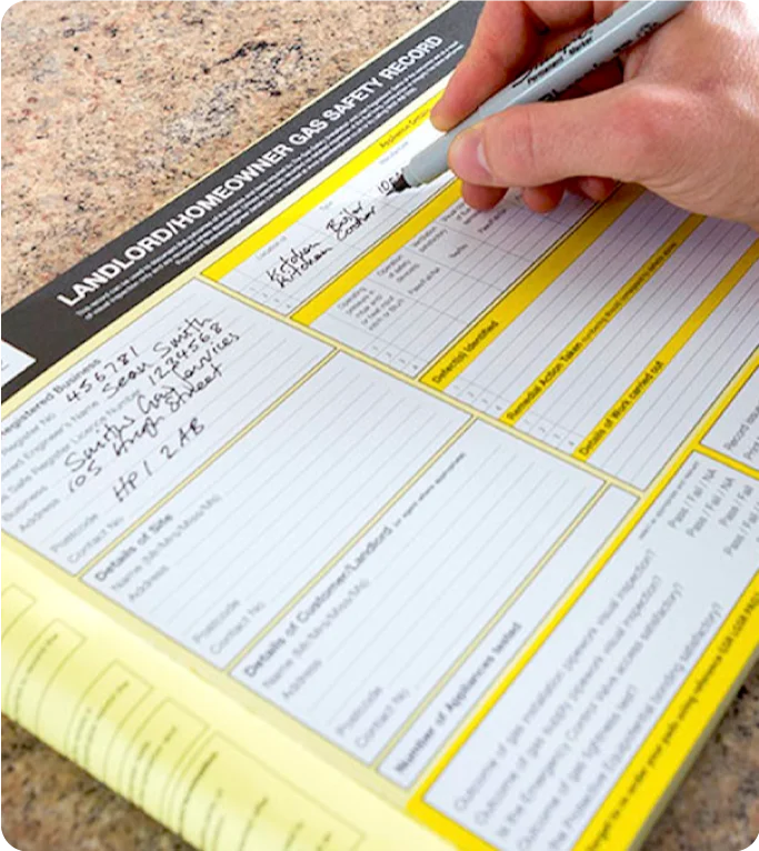 Gas Safe engineer completing a landlord gas safety record in Newcastle