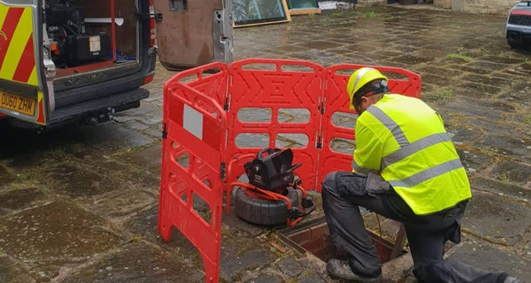 Drain repair and manhole access