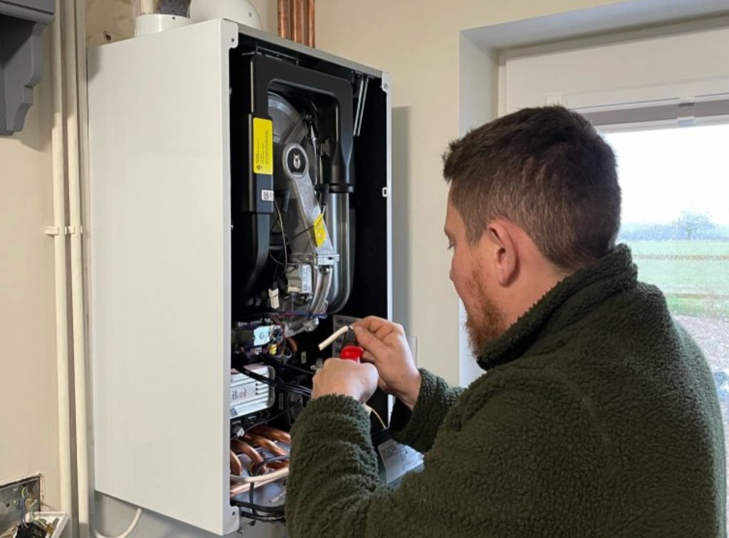 Gas Safe engineer repairing a domestic boiler in Chester-le-Street